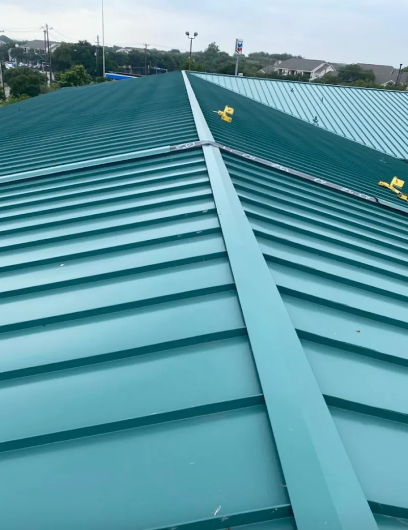 Green commercial metal roof ridge and valley for Metal Roof Repair in Acton